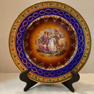 Elegant Decorative Porcelain Plate with Blue and Golden Accents